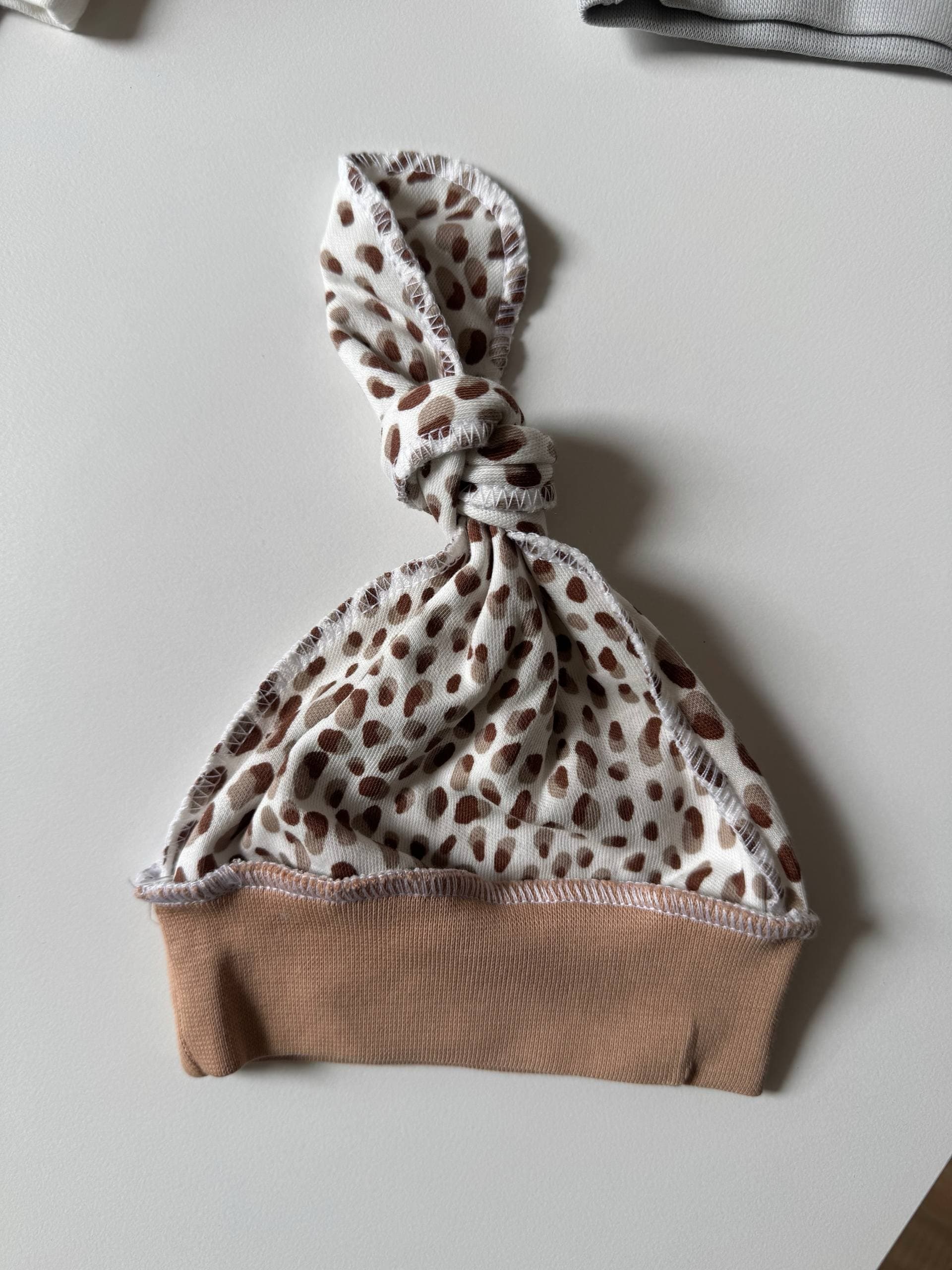 Шапочка для новонароджених інтерлок - Головне фото | Дитячий одяг Store Olivka